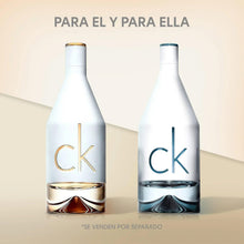 Two Eau de Toilette bottles, one gold-accented and one with blue-toned base
