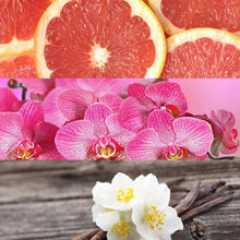 Grapefruit slices, pink orchid blooms, and white flowers fragrance styling