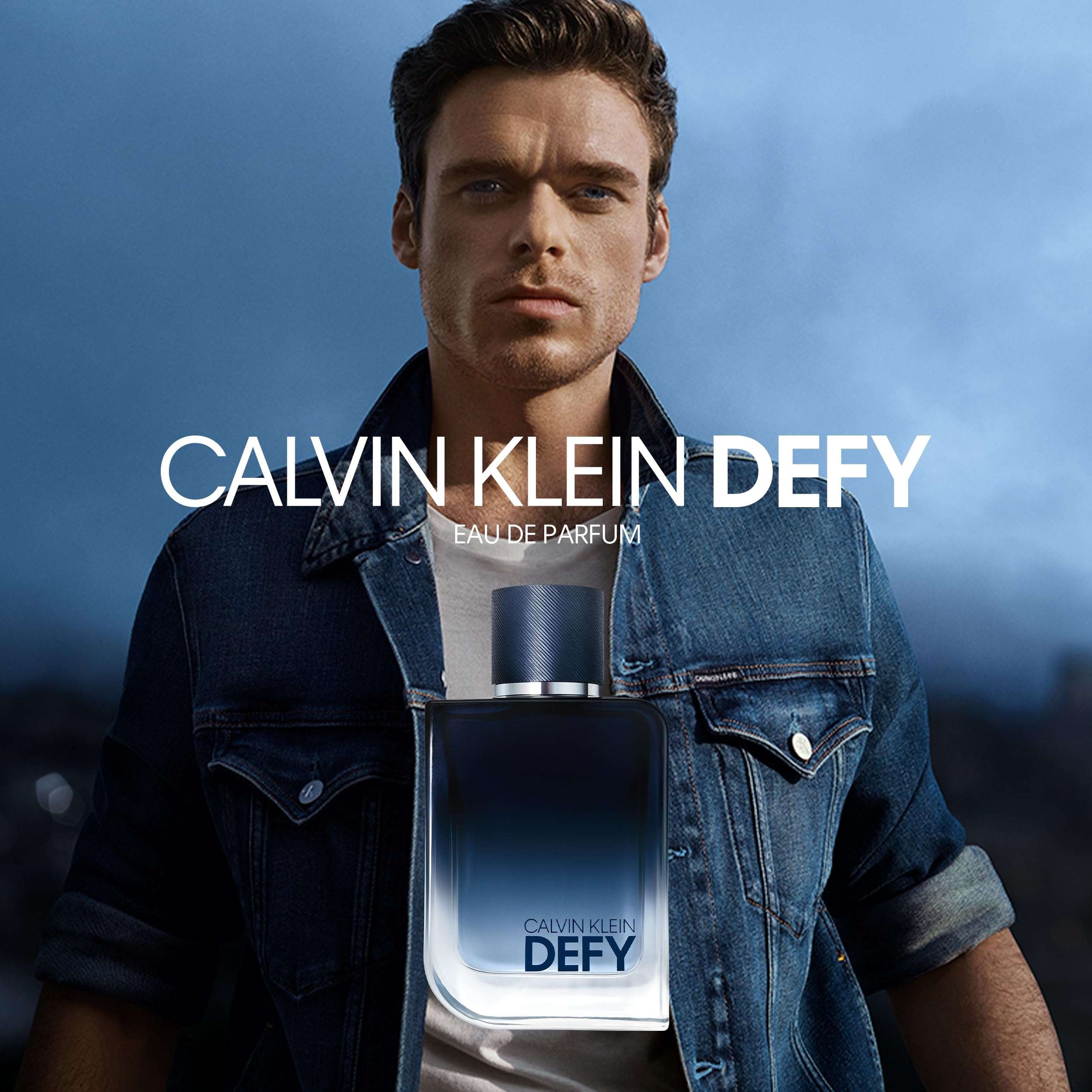 Calvin Klein Defy body spray for men featuring a stylish model in a denim jacket