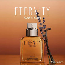 Eternity for Men parfum bottle with silver cap and bouquet beside it