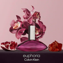 Calvin Klein Euphoria Eau de Parfum bottle, magenta glass with orchid flowers