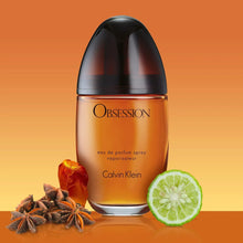 Calvin Klein Obsession Eau de Parfum bottle, amber liquid and dark domed cap
