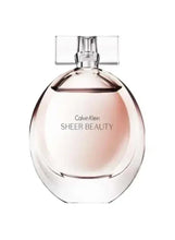 Calvin Klein Sheer Beauty EDT glass perfume bottle with spray top, pale pink tinted