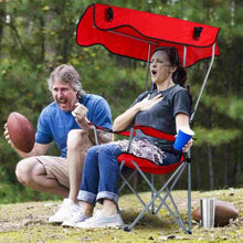 Red portable camp chair with shade canopy, padded back, folding legs