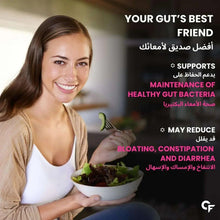 Probiotics supplement marketing scene: smiling woman holding a bowl of greens