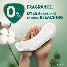 Organic cotton topsheet liner in hand, fragrance-free with white, curved cover