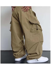 Khaki cargo style wide leg pants for ladies with elastic waistband and large side pockets