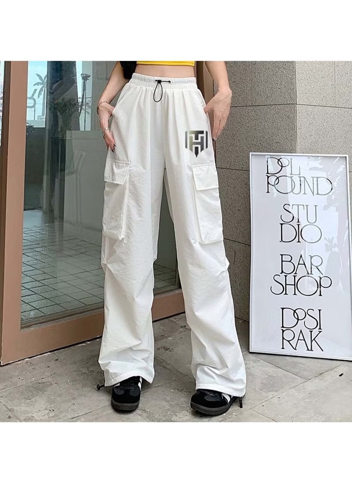 Huitich white cargo style wide leg pants for ladies with pockets and black drawstring waist