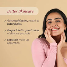 Woman holding a pink facial razor near her cheek for dermaplaning