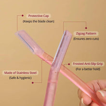 Pink facial razor with frosted anti-slip grip, protective cap, and zigzag blade