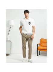 Huitich casual half zipper polo shirt in white worn by male model with beige pants