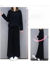 Women’s black two-piece casual suit: long-sleeve top and wide-leg pants, front full view