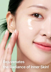 Close up of woman applying celimax noni ampoule UAE to cheek for dewy radiant skin and hydration