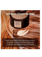 Face cream jar with a dollop of smooth white cream on a spoon