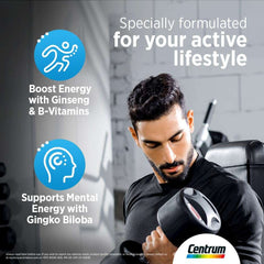 Man lifting dumbbell in gym with Centrum Energy multivitamin tablets branding highlighting energy and mental focus