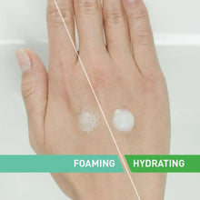 Hands with foaming cleanser swatches on skin and a small dollop near thumb