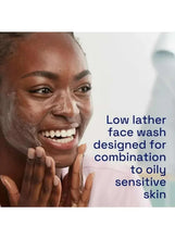 Facial cleanser lather on woman's hands and face