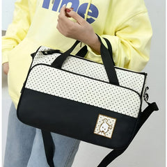 Huitich chic diaper bag for travel in black and white with polka dots and bunny patch