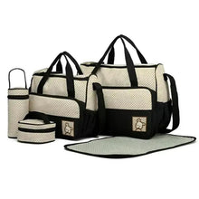 Diaper bag set with black straps, cream dotted panels, includes matching organizer and mat