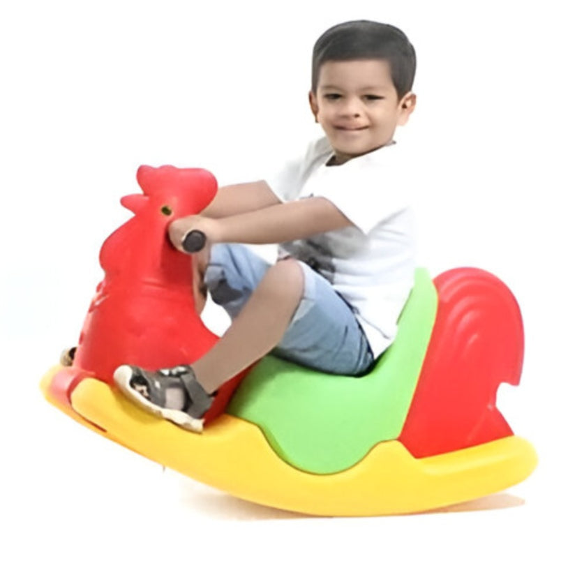 Child sitting on colorful Huitich chicken rocker ride on toy with red, green, and yellow design