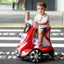 Red ride-on scooter with white canopy and front headlight, child seated