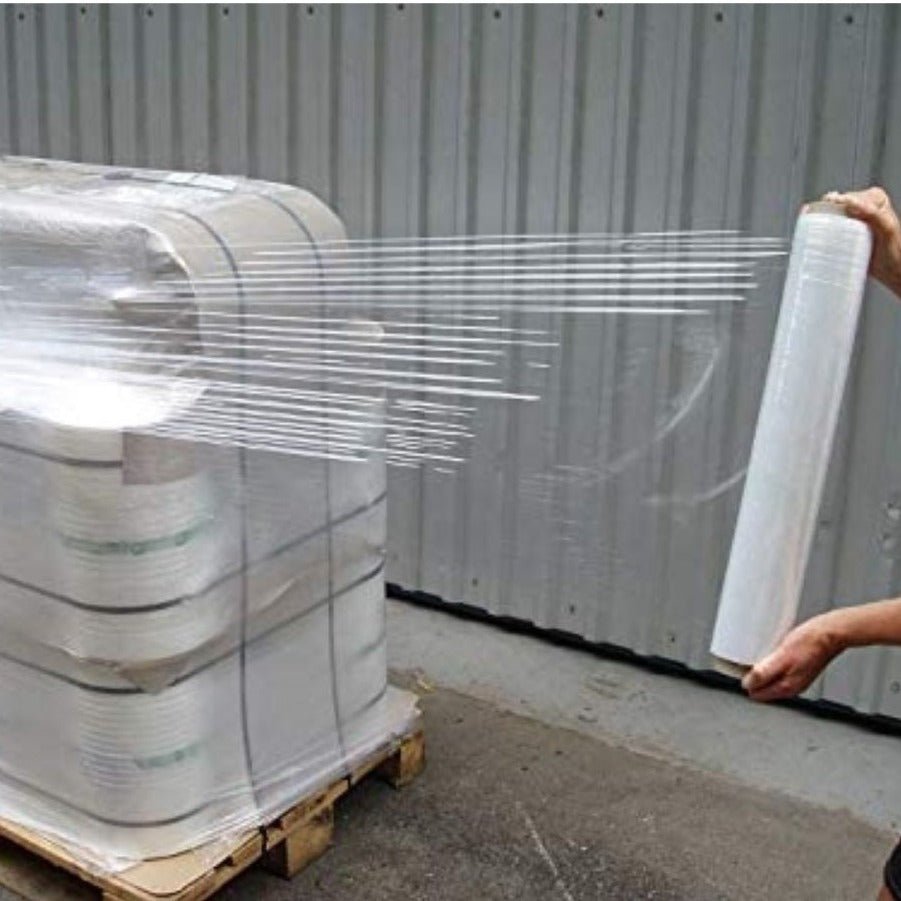 Huitich clear pallet wrapping roll 50cm being stretched to wrap goods on a wooden pallet