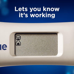 Close up of Clearblue digital pregnancy test UAE display with hourglass icon and Lets you know its working message
