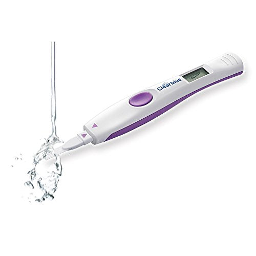 Clearblue ovulation test kit digital monitor stick with purple trim and LCD display and water over test tip