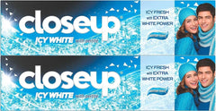 Closeup Icy White Toothpaste Winterblast pack icy blue double pack with smiling couple in winter hats and snowflakes