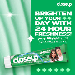 Closeup Triple Fresh Gel Toothpaste green tube with mint gel 24 hour freshness and smiling couple on packaging