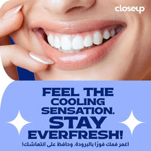 Closeup Cool Breeze toothpaste tube and blue Fresh Breath box