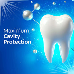 Colgate cavity protection toothpaste ad showing shiny tooth on blue background with molecules and maximum cavity protection text