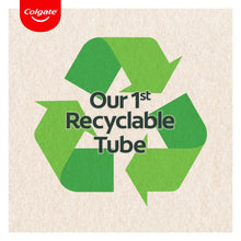 Toothpaste recyclable tube badge with recycling arrows and 'Our 1st Recyclable Tube'.