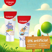 Colgate kids toothpaste tubes with 0% artificial label and dinosaur graphic