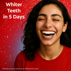 Smiling woman showing bright white teeth against red background Colgate Optic White Expert Toothpaste UAE