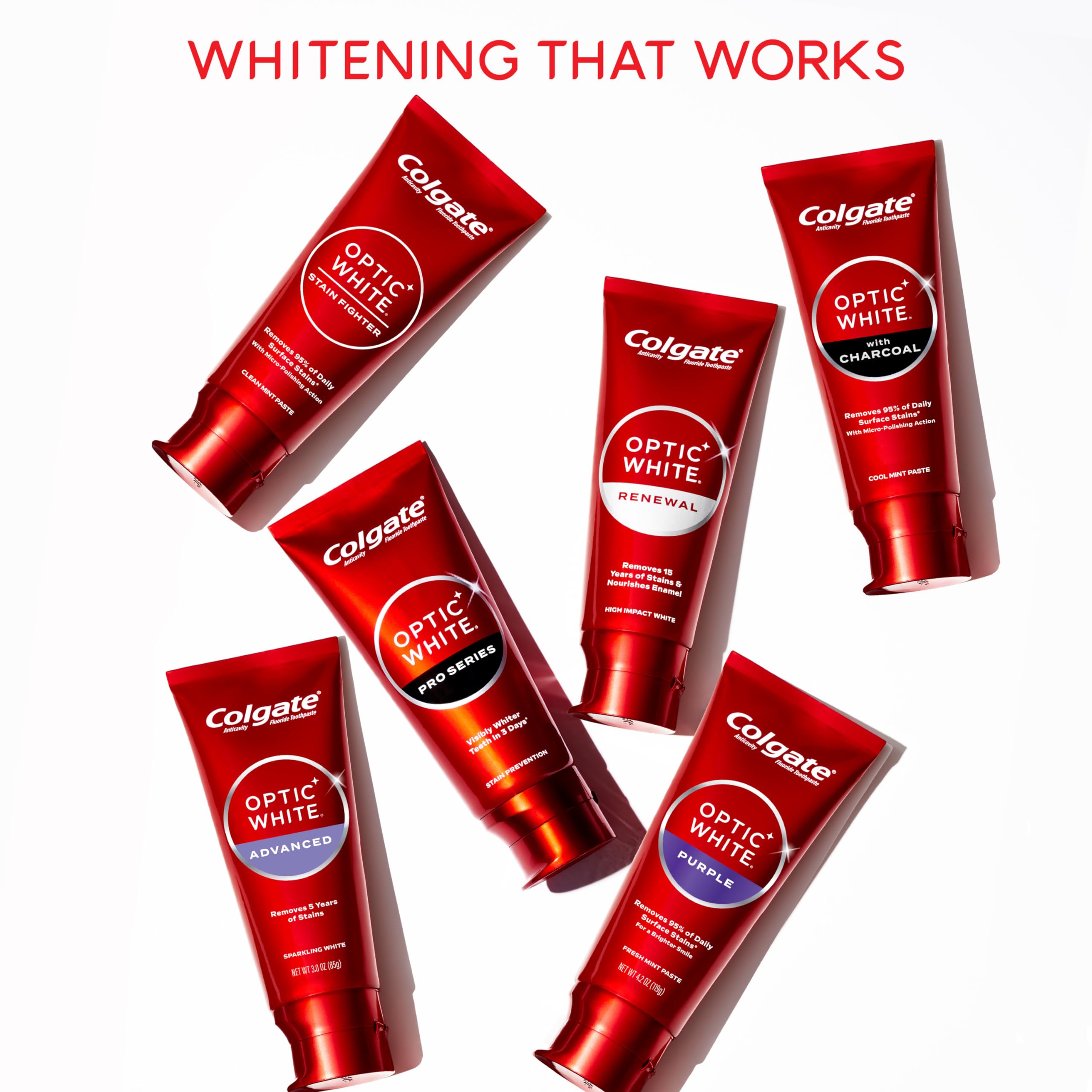 Display of six red Colgate tubes including Colgate optic white pro series toothpaste for whitening