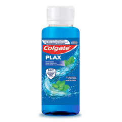 Colgate peppermint mouthwash 100ml Plax blue bottle with white cap mint leaves and water splash