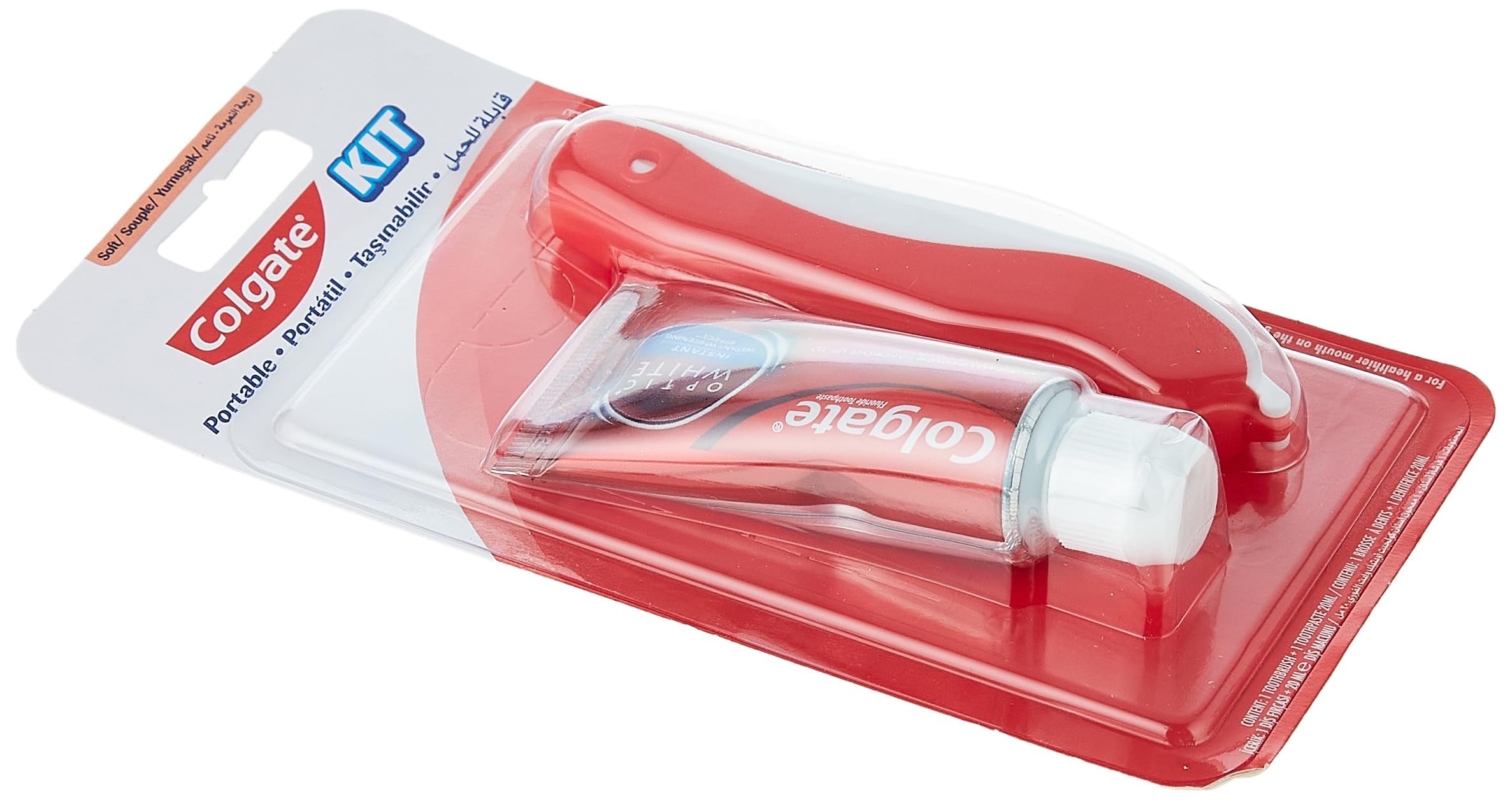 Colgate portable toothbrush and toothpaste set. Red folding travel toothbrush and travel size Colgate paste in blister pack