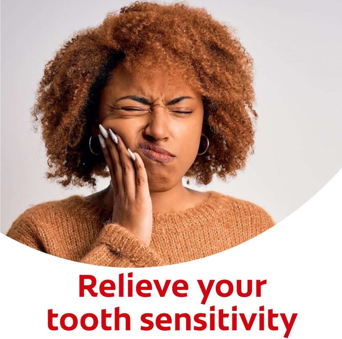 Woman holding jaw in pain beside text Relieve your tooth sensitivity promoting Colgate Sensitive Pro Relief Whitening Toothpaste