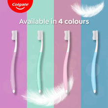 Set of Colgate ultra-soft toothbrushes with four handle colors and white bristles