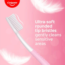 Colgate ultra-soft toothbrush with rounded bristle tip and light pink handle