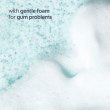 Dental foam for gum problems, blue-tinted lather