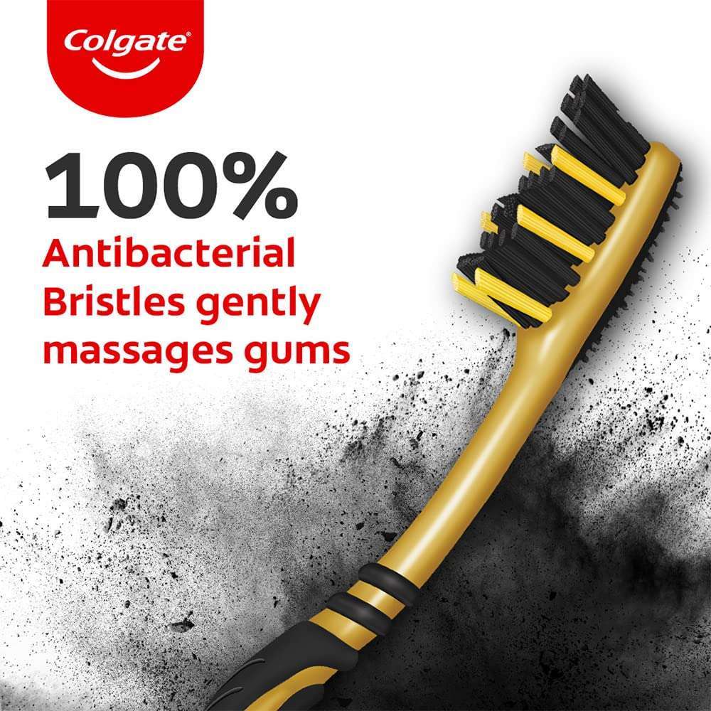 Colgate ZigZag charcoal toothbrush UAE showing black charcoal bristles and yellow ergonomic handle for gum care