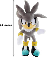 Gray Sonic-style plush standing, yellow muzzle, and blue feet pads