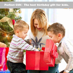 Kids opening a red gift box with a collectible sonic plush toy inside near a decorated Christmas tree