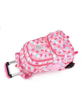 Pink geometric rolling school backpack lying down, showing front zipper and handle
