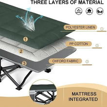 Green folding camping cot with sturdy frame and integrated mattress surface