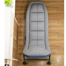 Gray cushioned lounge chair with segmented back panels on wheeled folding base