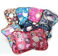 Black Olive patterned reusable electric hot water bag for pain relief in assorted floral and butterfly designs