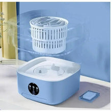 Light blue portable laundry washer with wash basket and open lid
